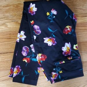 Black floral print stretch ankle skinny leg pants